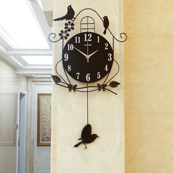 שעון קיר הסלון יצירתי ציפור שעון קיר האישיות המודרנית קיר דקורטיבי לצפות פשוט אווירה סווינג השתקת השעון